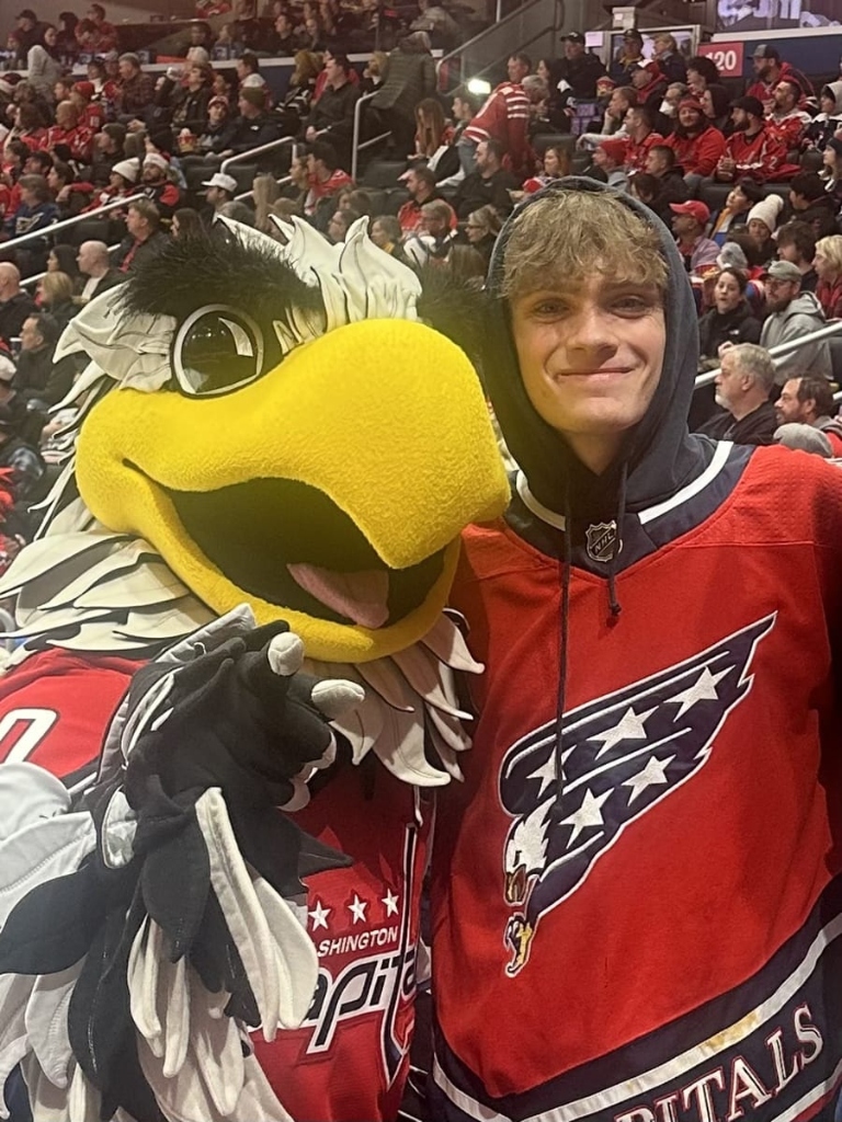 Ben Sachwitz in Washington Capitals jersey with team mascot