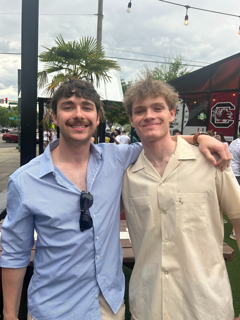 Ben Sachwitz with friend at South Carolina patio